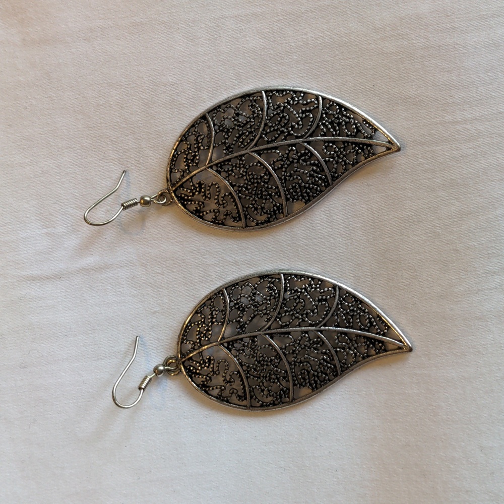 Silver Metal Colour Leaf Cutout Statement Boho Festival Earrings